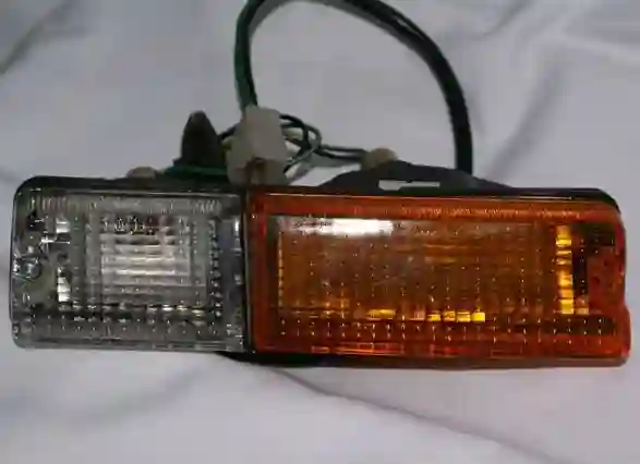 FAROL PARAG IZQ ISUZU GEMINI 81 (2 COLORES)