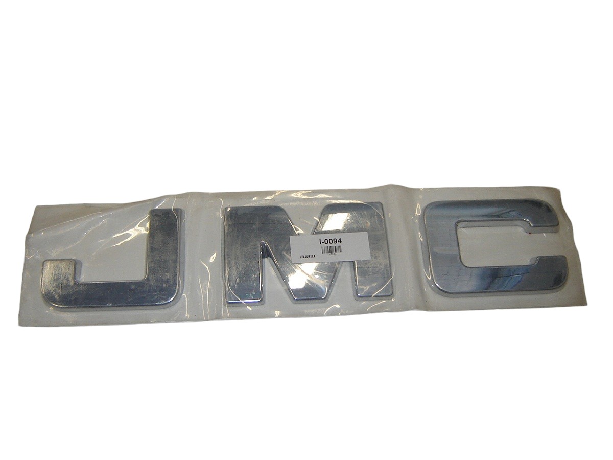 EMBLEMA PANEL FRENTE “JMC” JMC CAMIONES