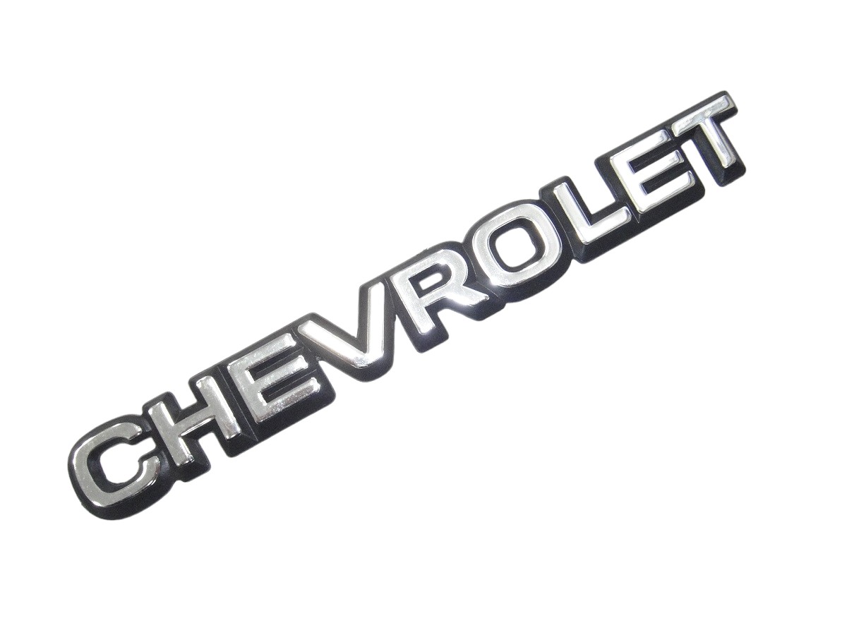EMBLEMA PUERTA TRAS*CH CORSA 94/96 “CHEVROLET”