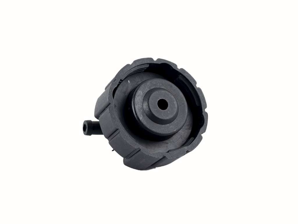 Tapón de depósito de fluido con caño