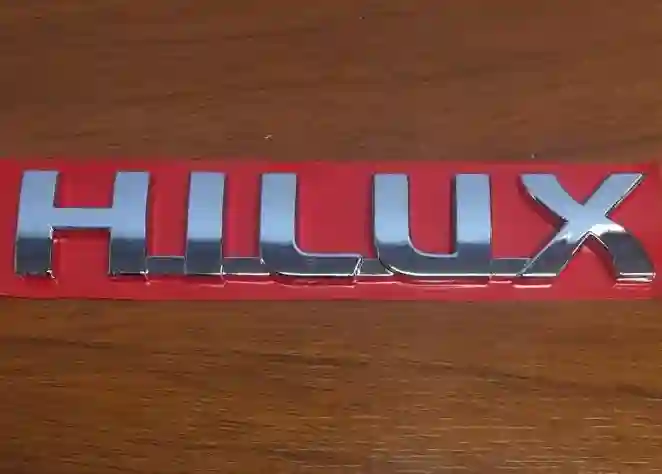 Emblema 'HILUX' para portón trasero de caja de carga