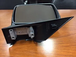 Espejo retrovisor izquierdo manual