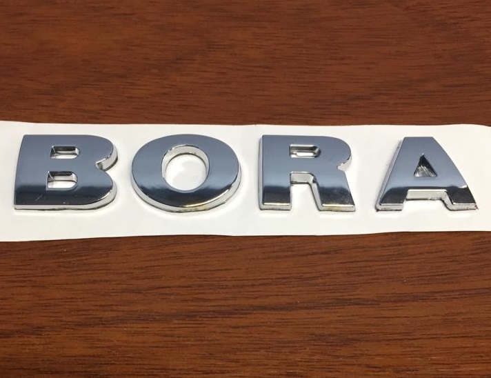 EMBLEMA VALIJA VW BORA 08 «BORA»
