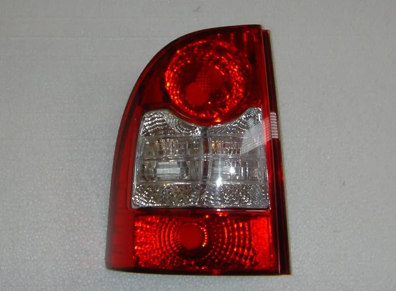 FAROL TRA IZQ FIAT STRADA 09 WUHUA