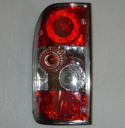 FAROL TRA IZQ ZX ADMIRAL 2010 TRANSPARENTE