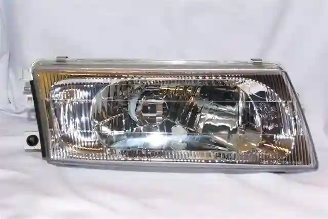 Faro delantero derecho Mitsubishi Lancer