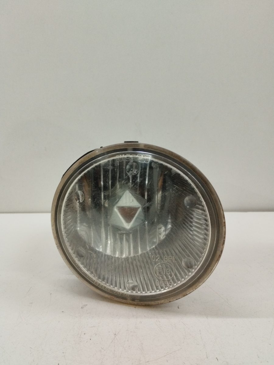 Faro Caminero Izquierdo Nissan Navara Pick-up (D40M) 2005-Actualidad Diesel CAT E130655