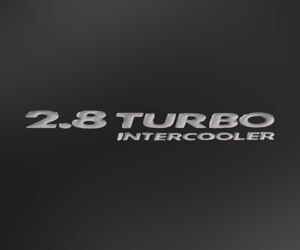 EMBLEMA 2.8 TURBO GRIS CLARO