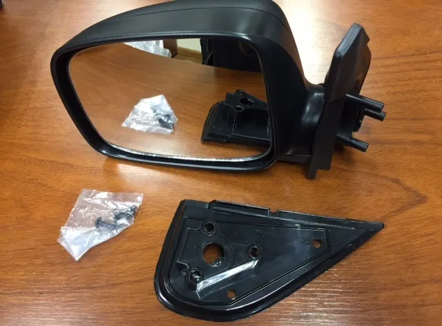 Espejo retrovisor lateral izquierdo con comando manual