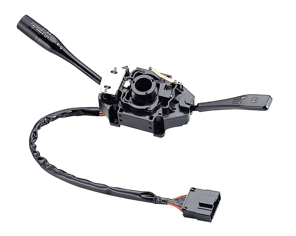 LLAVE BAJO VOLANTE MITSUBISHI SEÑALERO L200 SIN INTERMITENTE EN L-PARABR