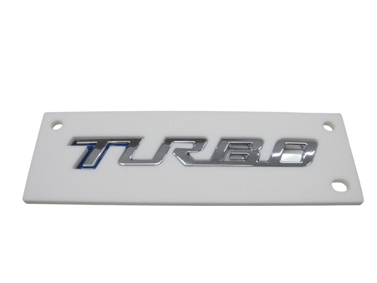 EMBLEMA “TURBO” T/TRA *CHEVROLET MONTANA 2023/
