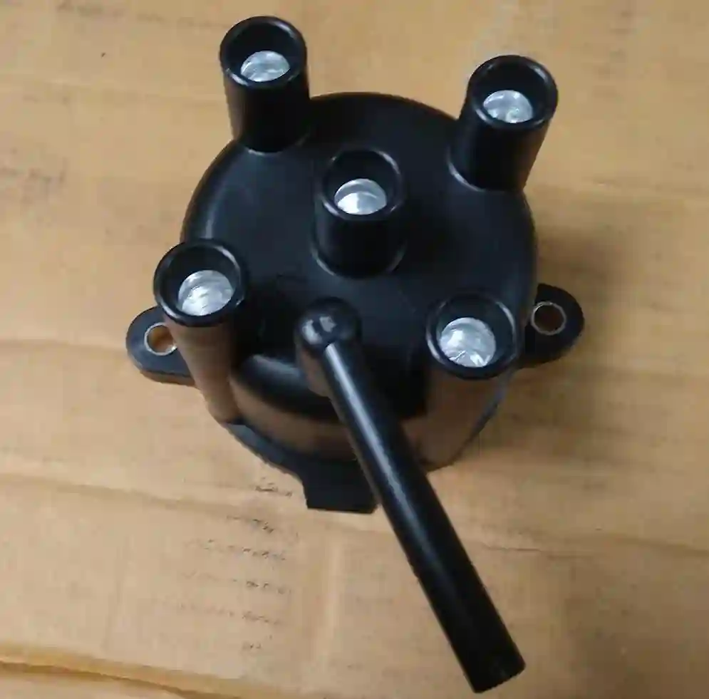 TAPA DISTRIBUIDOR DAIHATSU CHARADE G200 92
