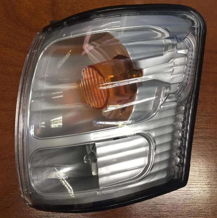 Farol delantero izquierdo cromado